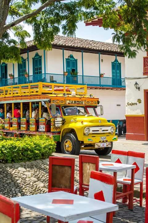 Colorful traditional chiva bus in the town of Jardín, Colombia